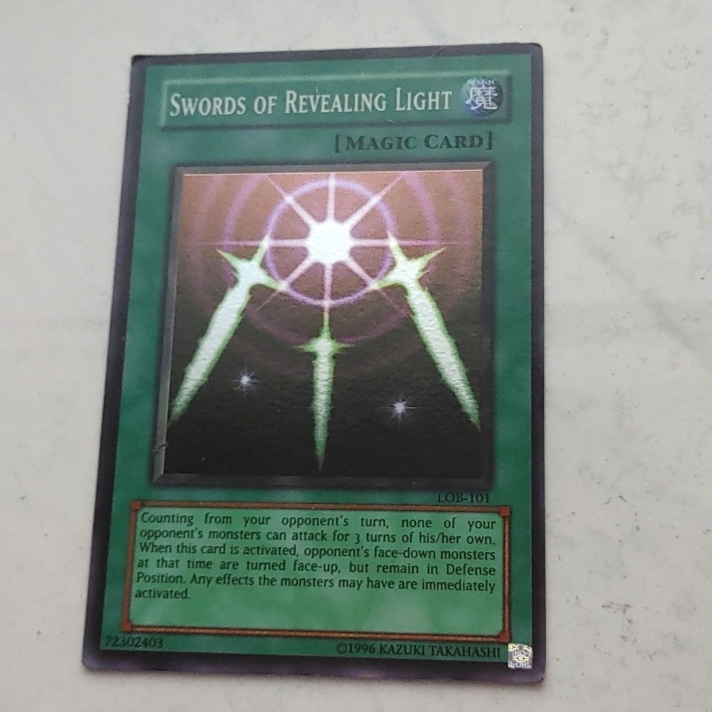 Yu-Gi-Oh! - Swords of Revealing Light LOB 101 holo card
